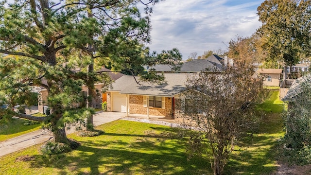 exterior space with a lawn and a garage