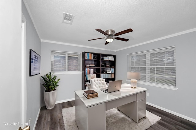 office area featuring ceiling fan, dark hardwood / wood-style flooring, a textured ceiling, and crown molding