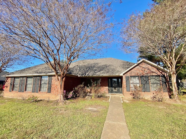 view of front of home with a front yard