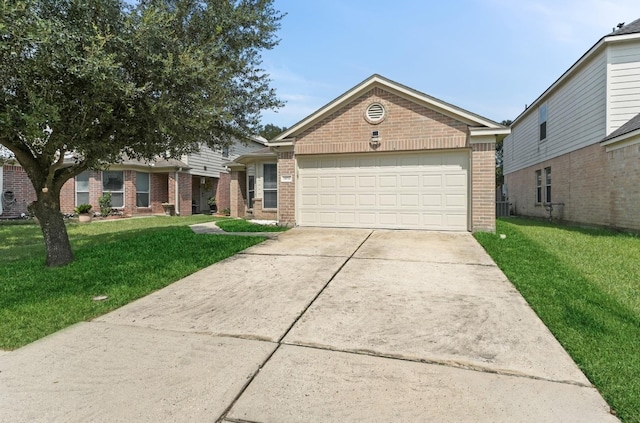 view of front of house with driveway, brick siding, a front lawn, and an attached garage