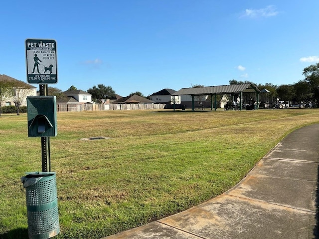 view of home's community featuring a lawn and a gazebo