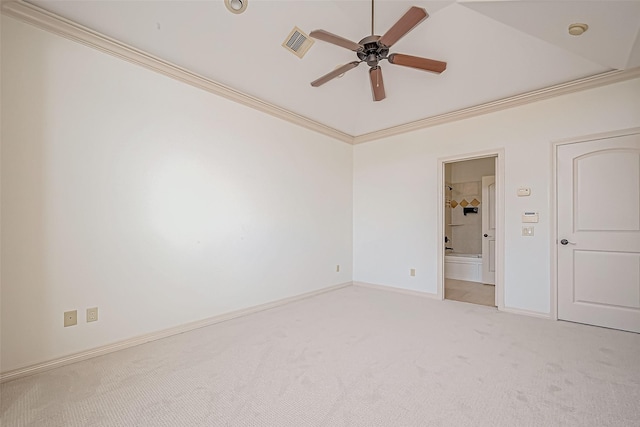 carpeted spare room with ceiling fan and crown molding