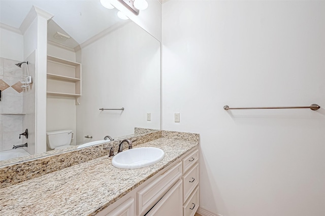 full bathroom featuring shower / tub combination, vanity, toilet, and crown molding