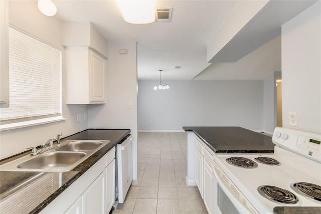 kitchen with sink, a notable chandelier, pendant lighting, white appliances, and white cabinets