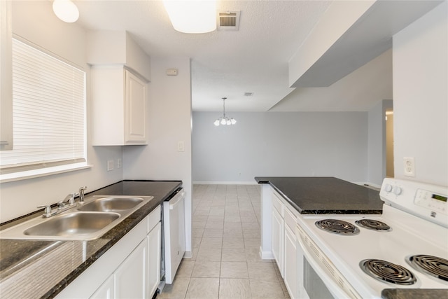 2530 Long Reach Dr, Sugar Land, TX 77478 - kitchen with white appliances, a sink, white cabinetry, light tile patterned floors, and a chandelier