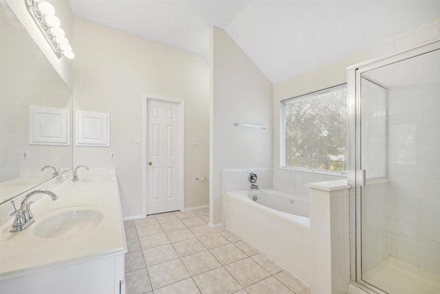 bathroom with tile patterned flooring, vanity, vaulted ceiling, and independent shower and bath