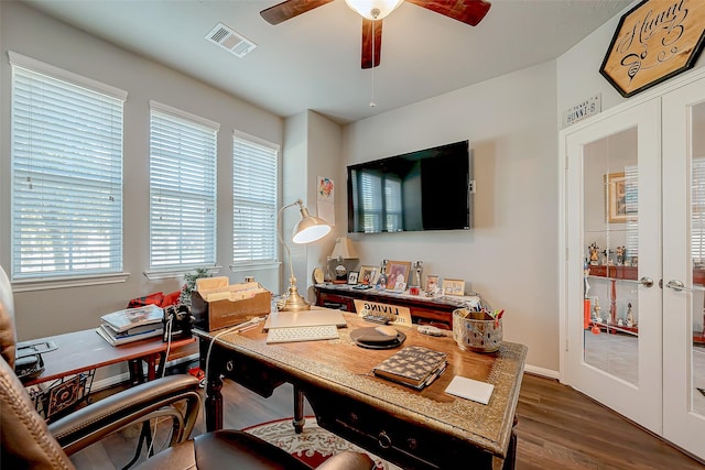 office area featuring dark wood-type flooring, french doors, and ceiling fan