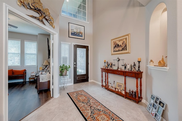 foyer entrance featuring light tile patterned floors