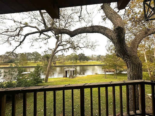 view of water feature with a dock