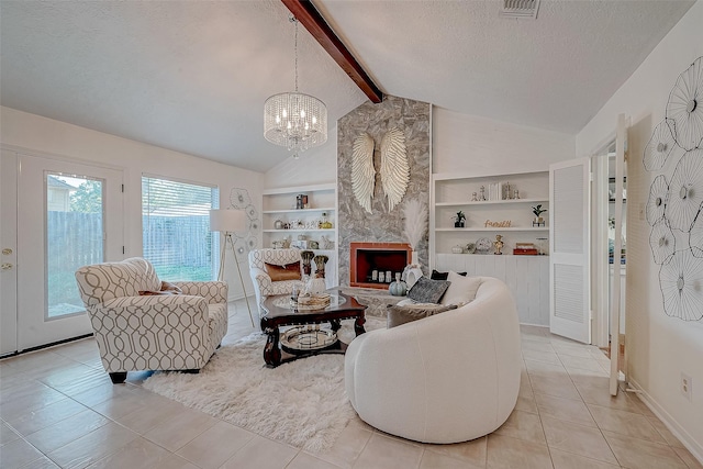 tiled living room with built in shelves, lofted ceiling with beams, a textured ceiling, and an inviting chandelier