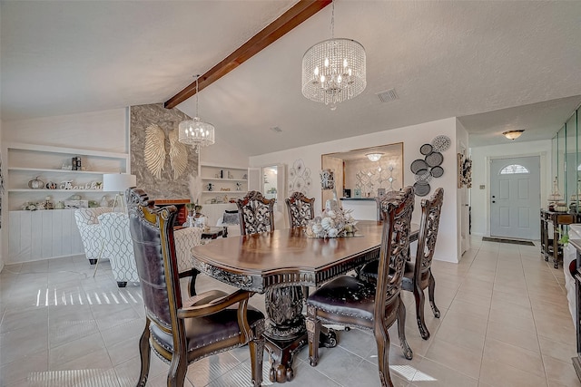 tiled dining area with vaulted ceiling with beams, built in features, a textured ceiling, and an inviting chandelier