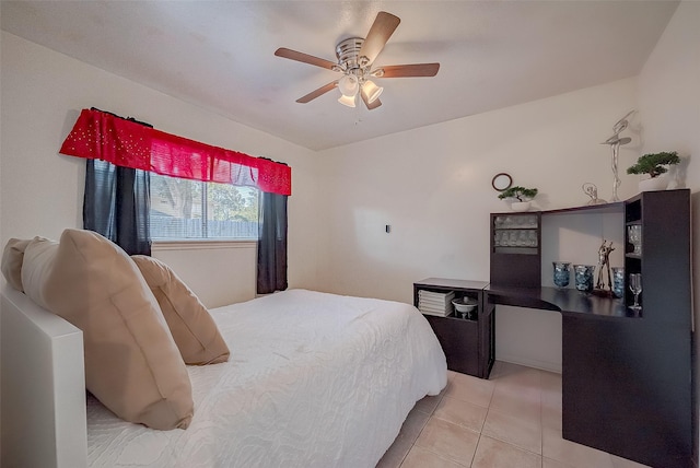 bedroom featuring ceiling fan and light tile patterned floors