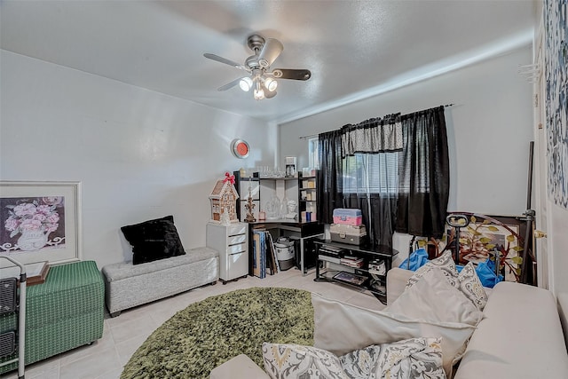 living room featuring ceiling fan and light tile patterned floors