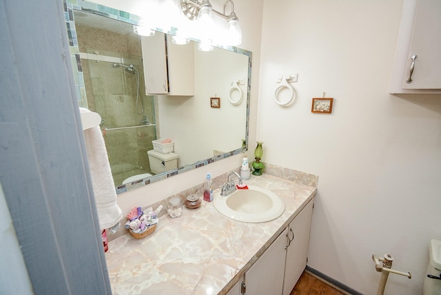 bathroom with vanity and an enclosed shower