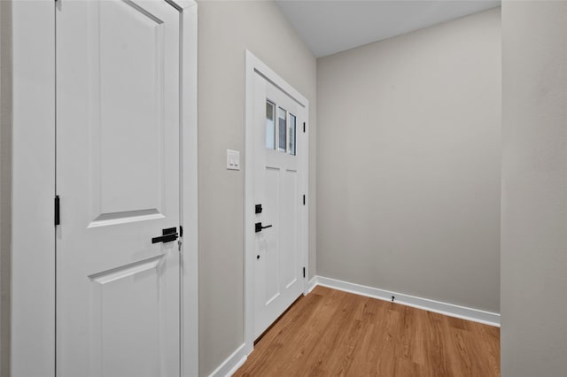 doorway with light hardwood / wood-style flooring