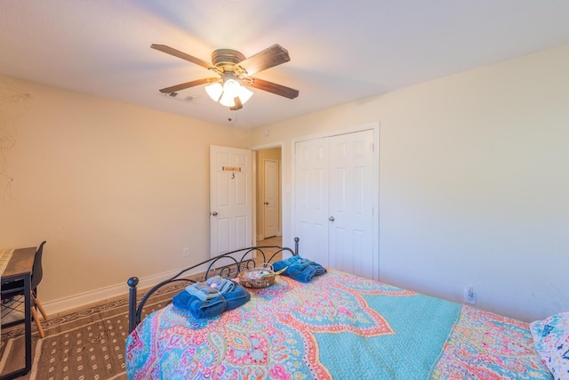 bedroom with a closet and ceiling fan