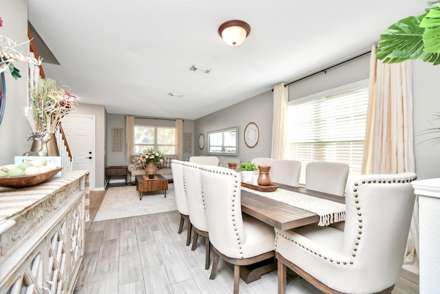 dining space featuring light hardwood / wood-style flooring