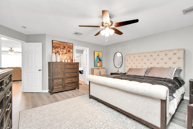 bedroom featuring light hardwood / wood-style flooring and ceiling fan