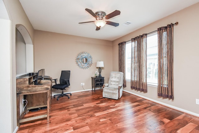 office with ceiling fan and wood-type flooring