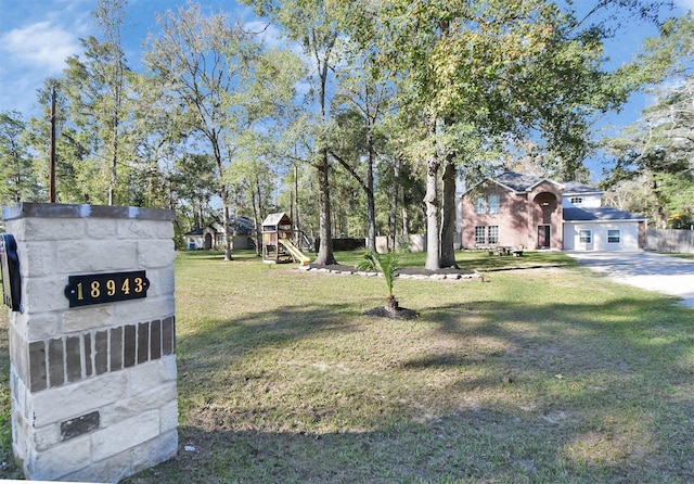 view of yard featuring a playground