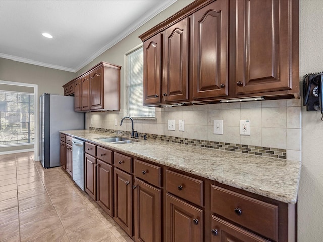 kitchen featuring sink, tasteful backsplash, dark brown cabinets, appliances with stainless steel finishes, and ornamental molding