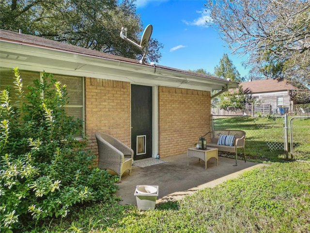 exterior space featuring a lawn and a patio