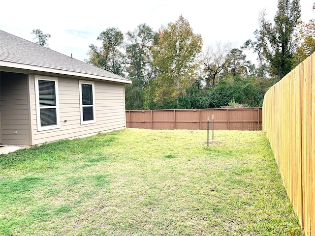 view of yard featuring a fenced backyard