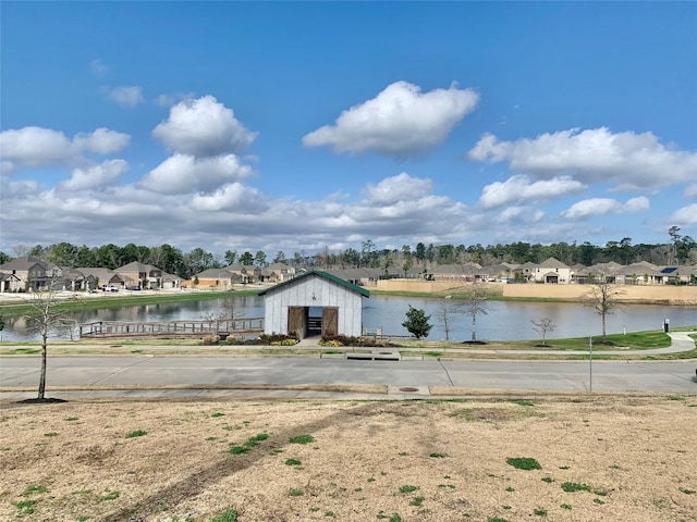 view of water feature with a residential view