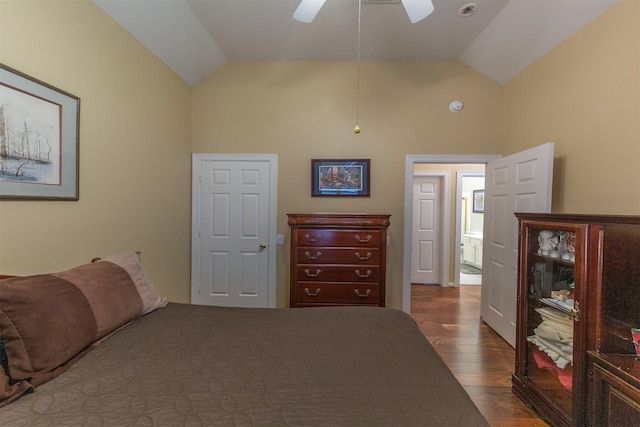 bedroom featuring ceiling fan, dark wood-type flooring, and high vaulted ceiling