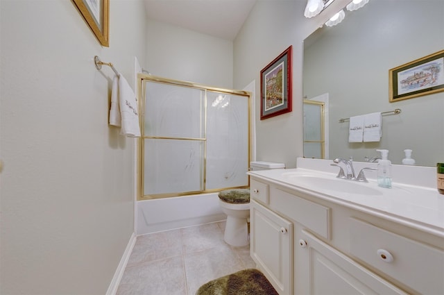 full bathroom with tile patterned floors, vanity, enclosed tub / shower combo, and toilet