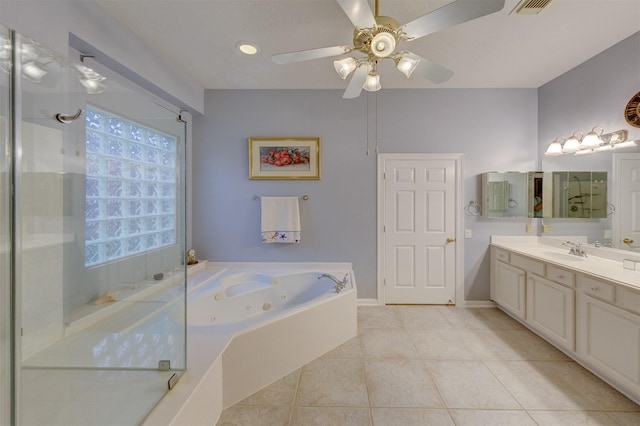 bathroom featuring tile patterned floors, ceiling fan, separate shower and tub, and vanity