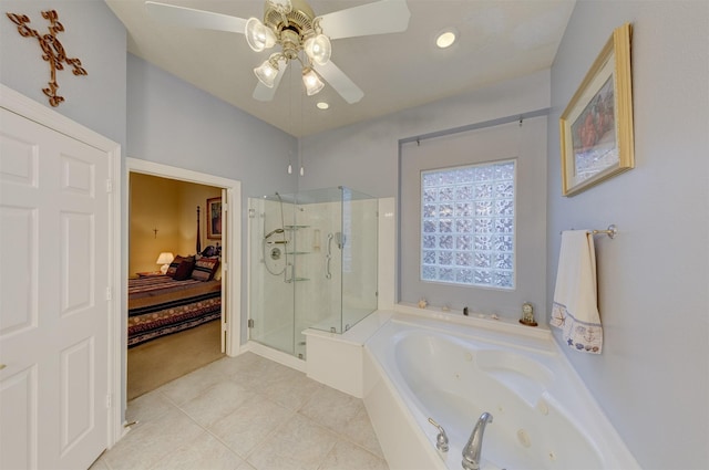 bathroom featuring tile patterned flooring, ceiling fan, and plus walk in shower