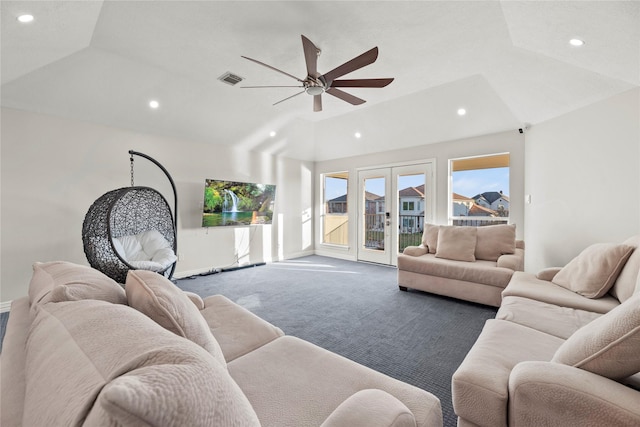 carpeted living room with ceiling fan, french doors, and lofted ceiling