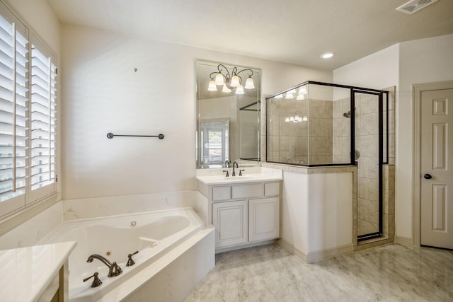 bathroom with a stall shower, visible vents, and plenty of natural light