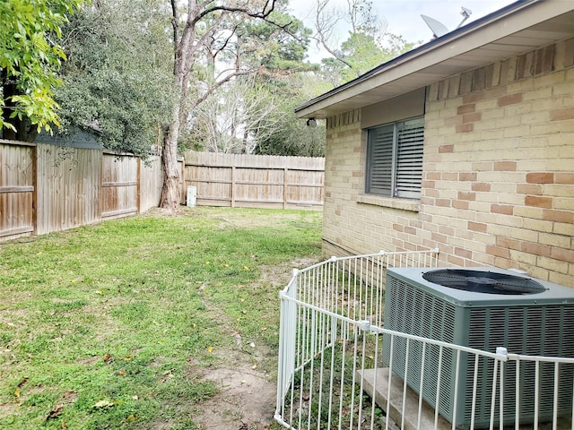 view of yard featuring central AC unit