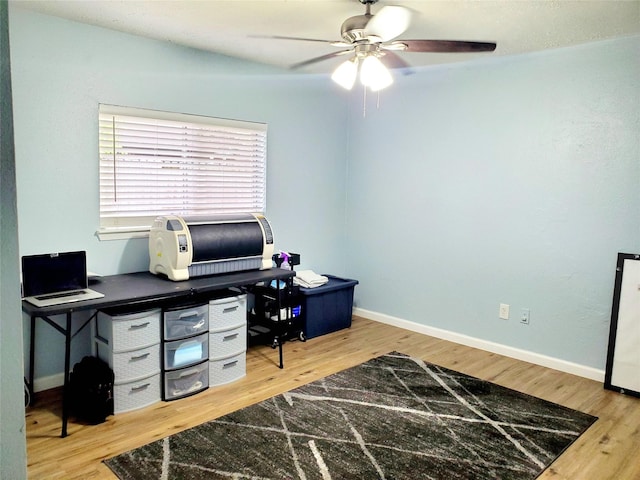 home office with ceiling fan and wood-type flooring