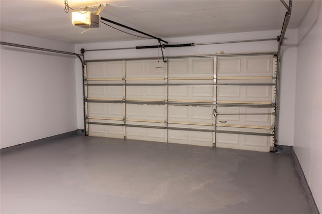 4507 Adonis Dr, Spring, TX 77373 - garage with a garage door opener and baseboards