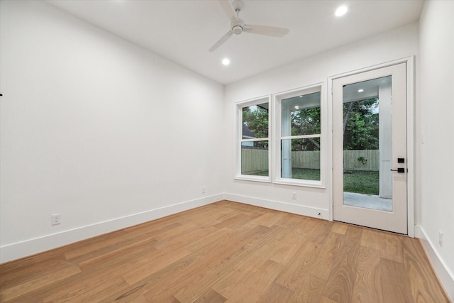 unfurnished room with light hardwood / wood-style floors and ceiling fan