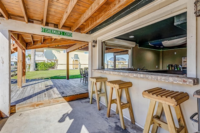 view of patio featuring a bar