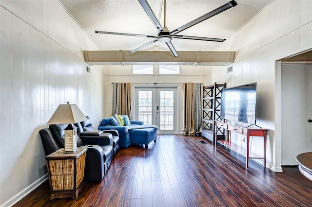 living room featuring french doors, dark hardwood / wood-style floors, ceiling fan, and crown molding