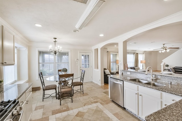 kitchen featuring a wealth of natural light, white cabinetry, sink, and stainless steel appliances