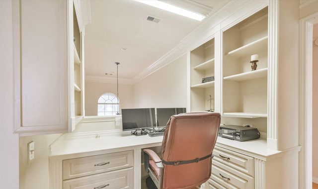 office with built in desk and crown molding