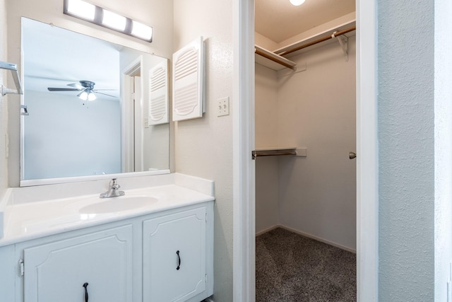 bathroom with vanity and ceiling fan