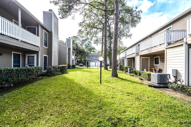 view of yard featuring central AC unit