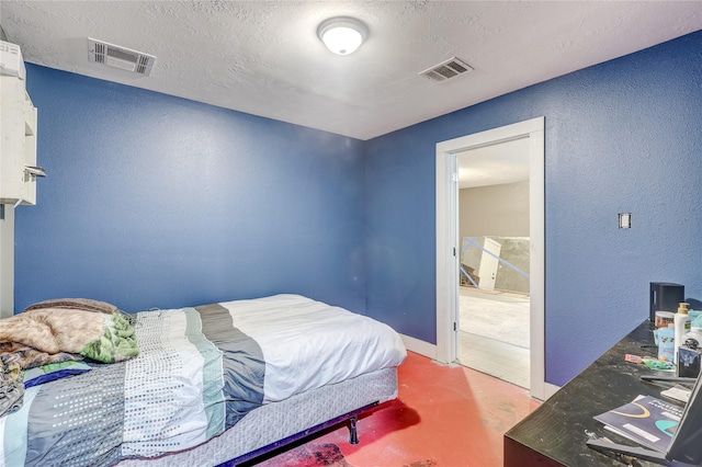 bedroom with a textured ceiling