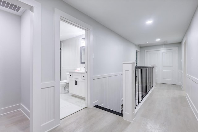 hallway featuring light wood-type flooring