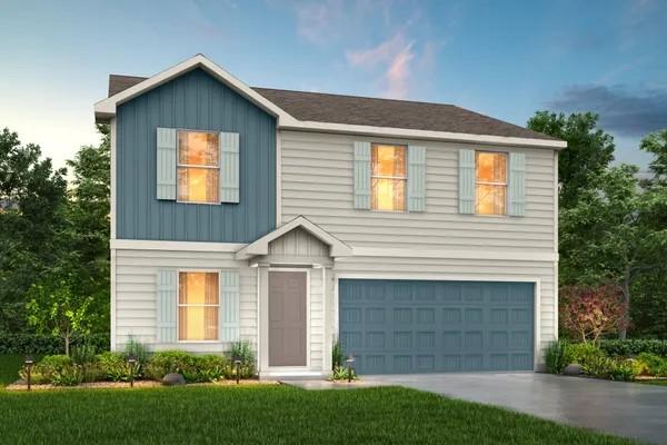 365 E Northpointe Ave, La Grange, TX 78945 - view of front of property with a garage, board and batten siding, concrete driveway, and a front yard