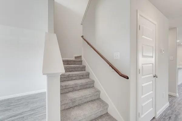 365 E Northpointe Ave, La Grange, TX 78945 - stairway with wood finished floors and baseboards