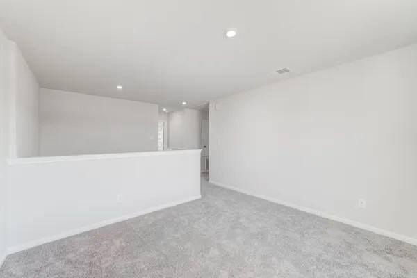 365 E Northpointe Ave, La Grange, TX 78945 - carpeted spare room featuring recessed lighting and baseboards