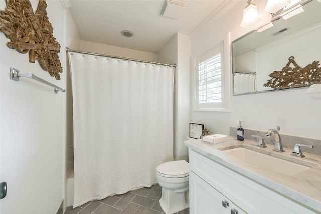 bathroom with vanity, toilet, and ornamental molding